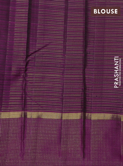 Pure kanchipuram silk saree green and purple with allover zari checked pattern and zari checked border
