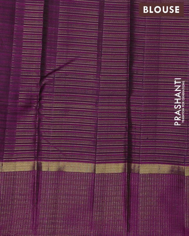 Pure kanchipuram silk saree green and purple with allover zari checked pattern and zari checked border