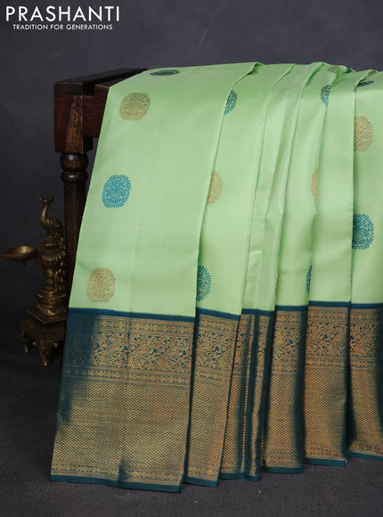 Pure kanchipuram silk saree pista green and peacock green with thread & zari woven buttas and zari woven korvai border