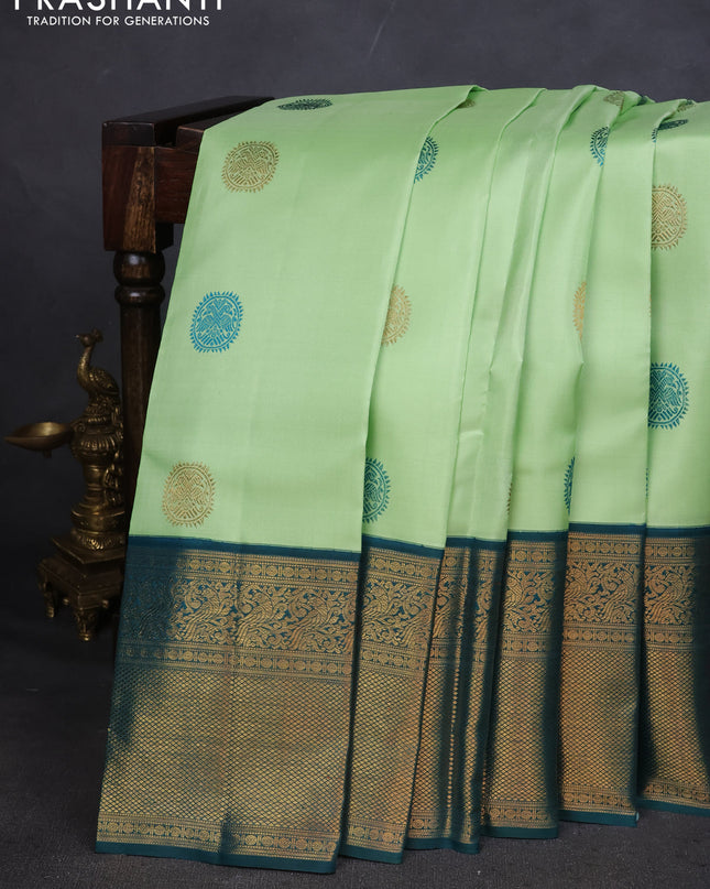 Pure kanchipuram silk saree pista green and peacock green with thread & zari woven buttas and zari woven korvai border