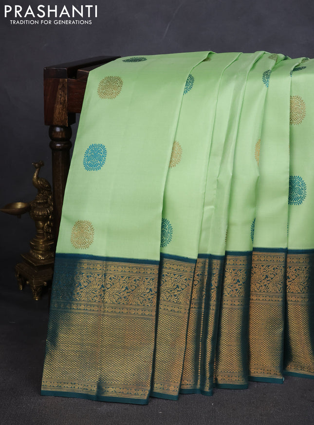 Pure kanchipuram silk saree pista green and peacock green with thread & zari woven buttas and zari woven korvai border