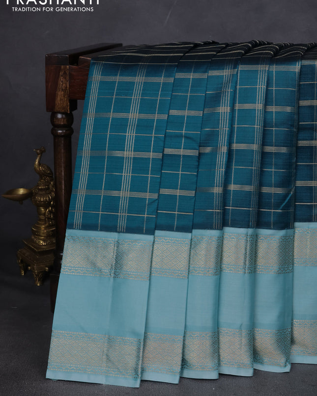Pure kanchipuram silk saree peacock blue and light blue with allover zari checked pattern and rettapet zari woven border