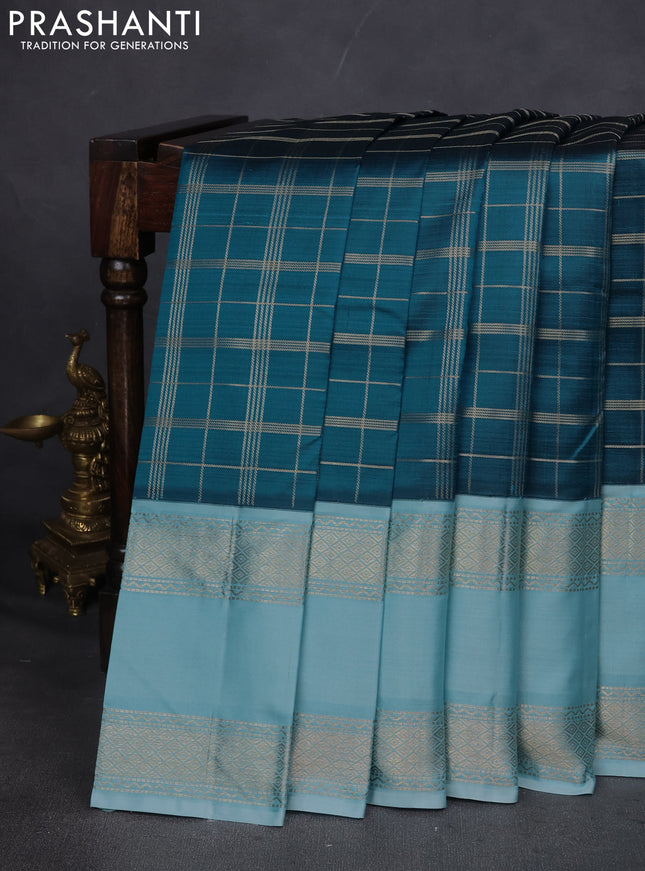 Pure kanchipuram silk saree peacock blue and light blue with allover zari checked pattern and rettapet zari woven border
