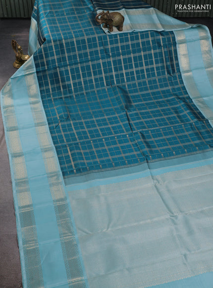 Pure kanchipuram silk saree peacock blue and light blue with allover zari checked pattern and rettapet zari woven border