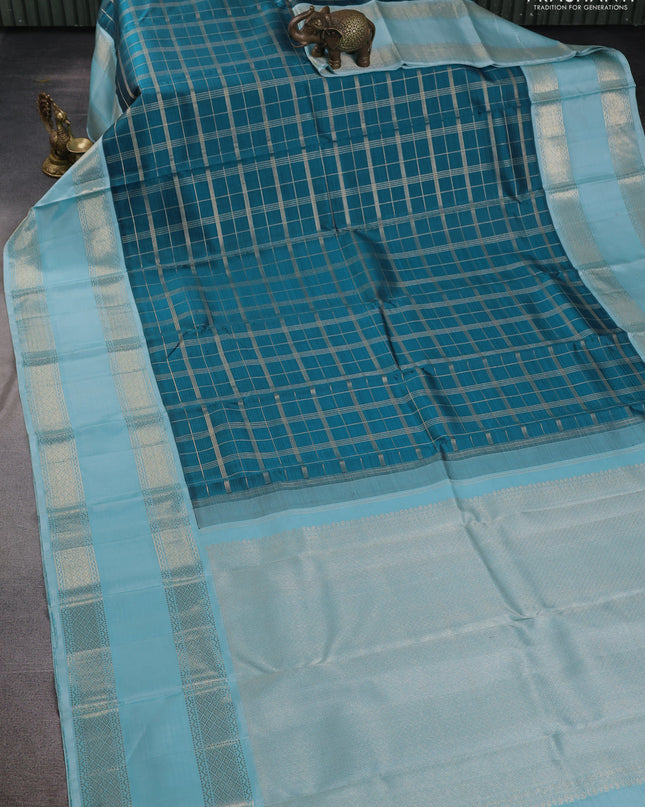 Pure kanchipuram silk saree peacock blue and light blue with allover zari checked pattern and rettapet zari woven border