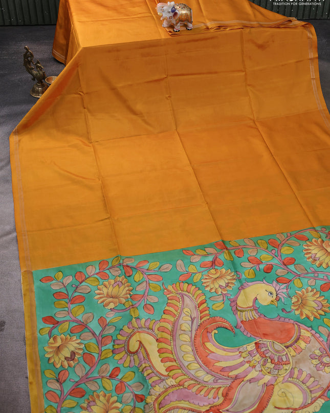 Pure Soft silk saree mustard yellow and teal green with plain body and hand painted kalamkari pallu