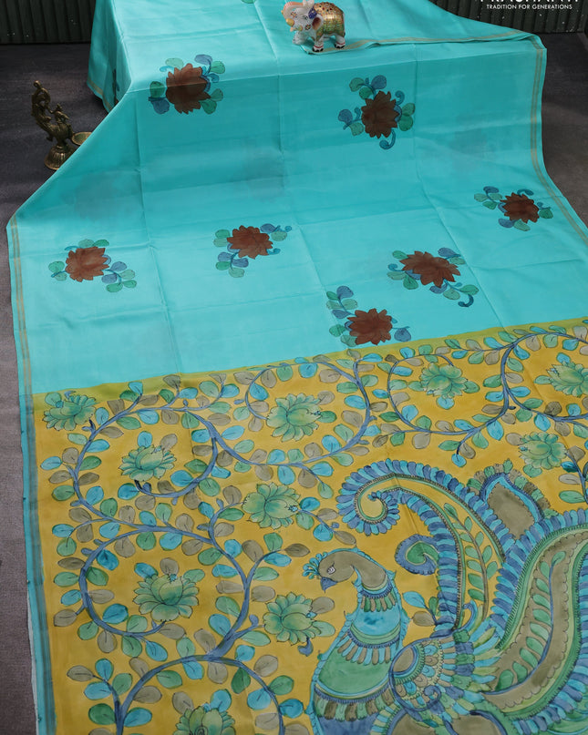 Pure Soft silk saree teal blue and yellow with plain body and hand painted kalamkari pallu