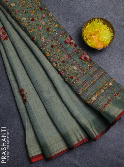 Linen cotton saree green shade and maroon with embroidery buttas and embroidery pallu