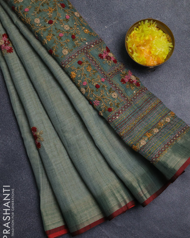 Linen cotton saree green shade and maroon with embroidery buttas and embroidery pallu