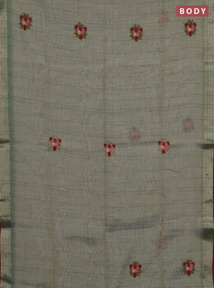 Linen cotton saree green shade and maroon with embroidery buttas and embroidery pallu