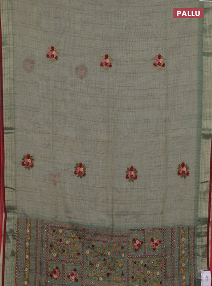 Linen cotton saree green shade and maroon with embroidery buttas and embroidery pallu