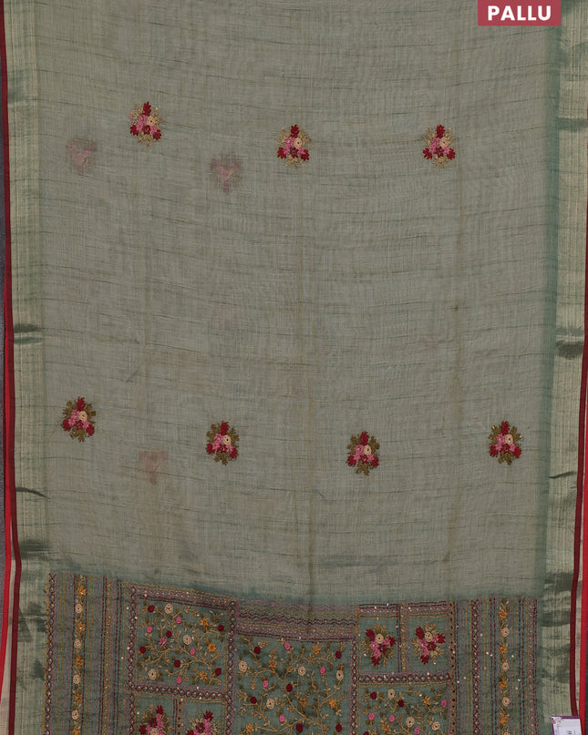 Linen cotton saree green shade and maroon with embroidery buttas and embroidery pallu