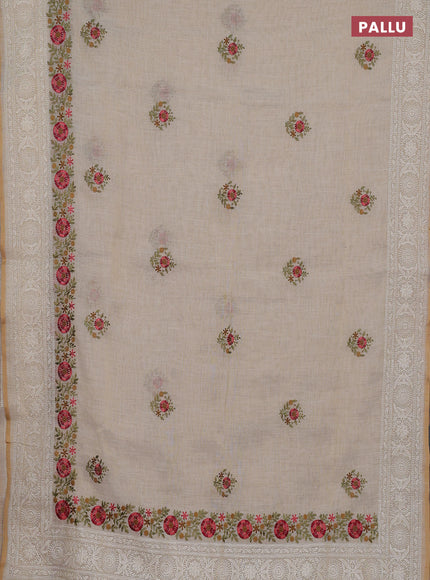 Linen cotton saree cream with embroidery buttas and embroidery pallu