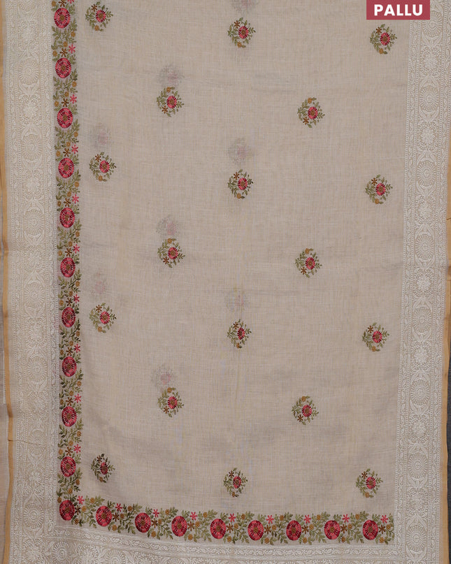 Linen cotton saree cream with embroidery buttas and embroidery pallu