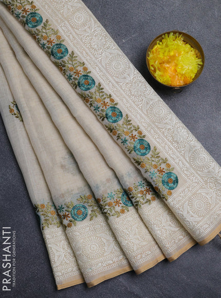 Linen cotton saree cream with embroidery buttas and embroidery pallu
