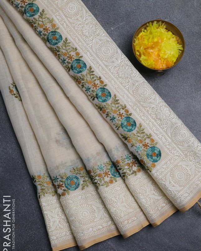 Linen cotton saree cream with embroidery buttas and embroidery pallu
