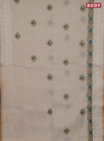 Linen cotton saree cream with embroidery buttas and embroidery pallu