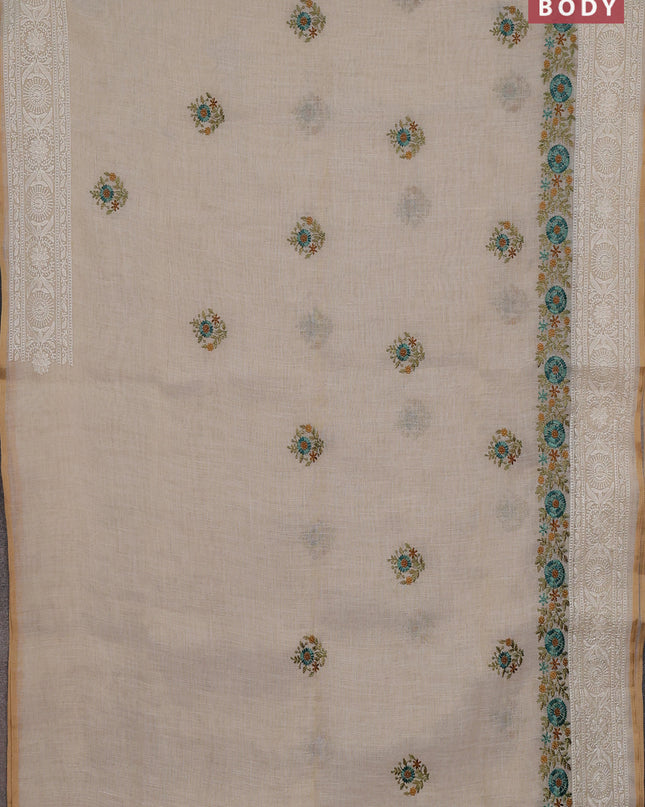 Linen cotton saree cream with embroidery buttas and embroidery pallu