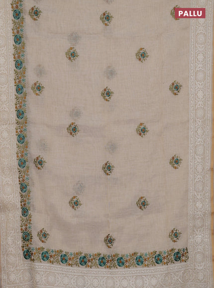 Linen cotton saree cream with embroidery buttas and embroidery pallu