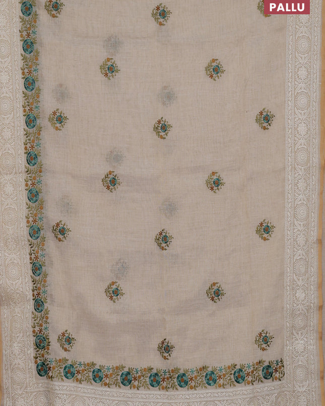 Linen cotton saree cream with embroidery buttas and embroidery pallu