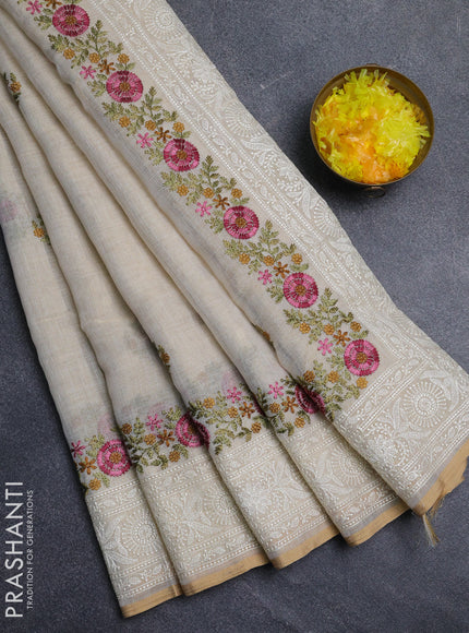 Linen cotton saree cream with embroidery buttas and embroidery pallu