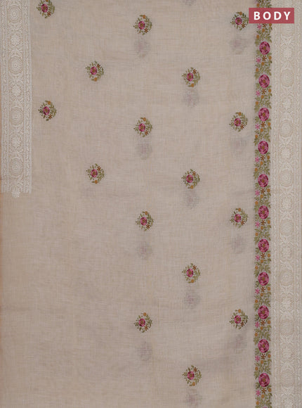 Linen cotton saree cream with embroidery buttas and embroidery pallu