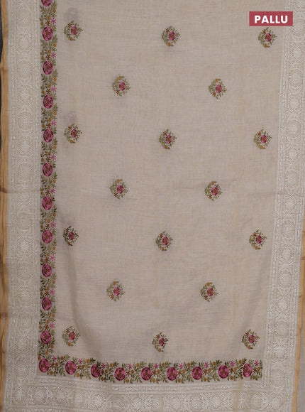 Linen cotton saree cream with embroidery buttas and embroidery pallu