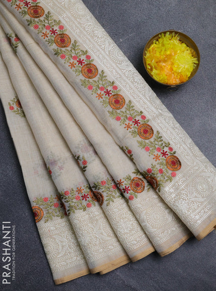 Linen cotton saree cream with embroidery buttas and embroidery pallu