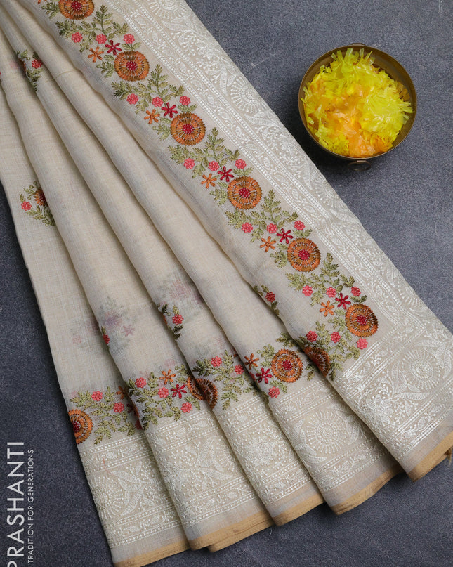 Linen cotton saree cream with embroidery buttas and embroidery pallu