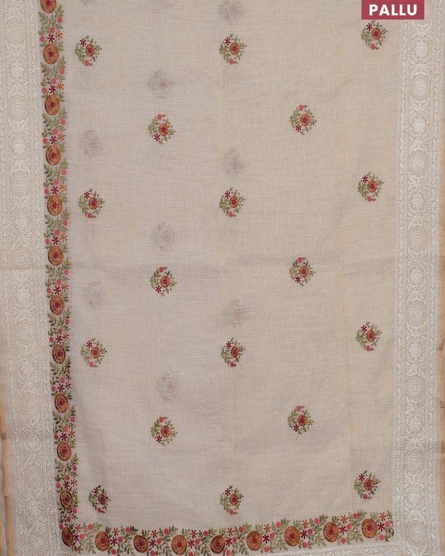 Linen cotton saree cream with embroidery buttas and embroidery pallu
