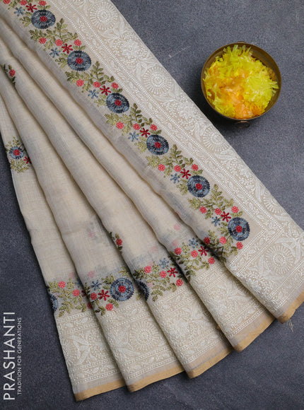 Linen cotton saree cream with embroidery buttas and embroidery pallu