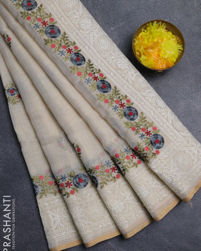 Linen cotton saree cream with embroidery buttas and embroidery pallu