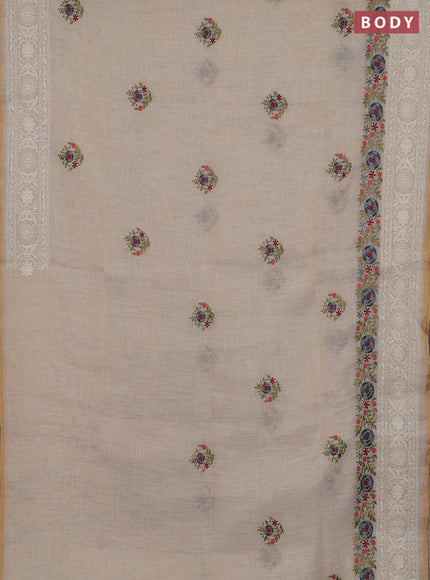 Linen cotton saree cream with embroidery buttas and embroidery pallu