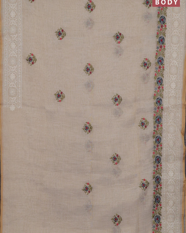 Linen cotton saree cream with embroidery buttas and embroidery pallu