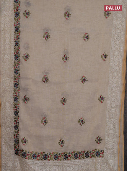 Linen cotton saree cream with embroidery buttas and embroidery pallu