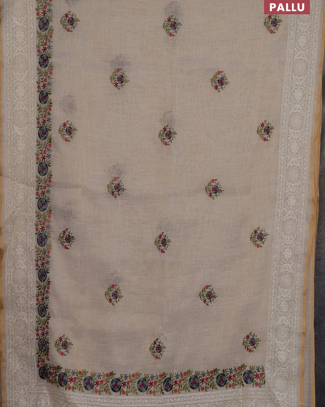 Linen cotton saree cream with embroidery buttas and embroidery pallu