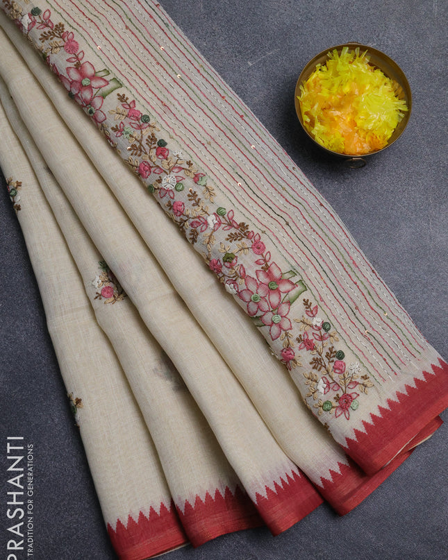 Linen cotton saree cream and maroon with embroidery buttas and embroidery pallu