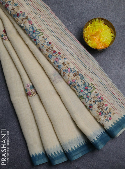 Linen cotton saree cream and cs blue with embroidery buttas and embroidery pallu
