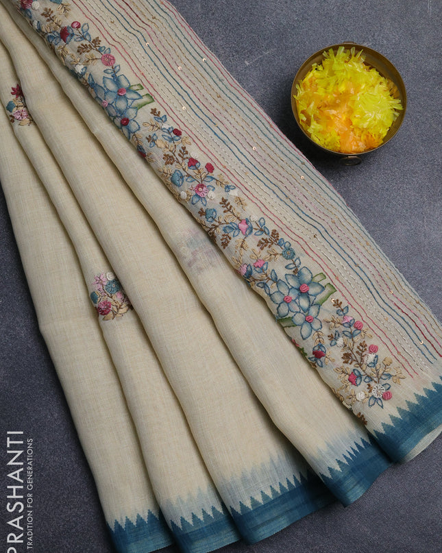 Linen cotton saree cream and cs blue with embroidery buttas and embroidery pallu