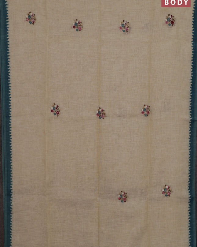 Linen cotton saree cream and cs blue with embroidery buttas and embroidery pallu