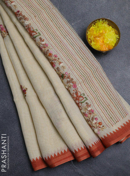 Linen cotton saree cream and rust with embroidery buttas and embroidery pallu