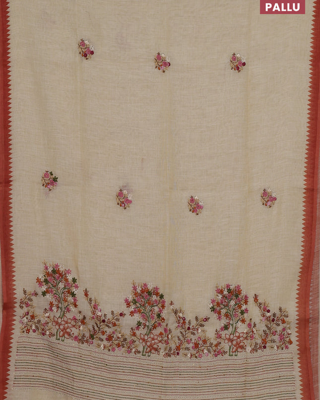 Linen cotton saree cream and rust with embroidery buttas and embroidery pallu