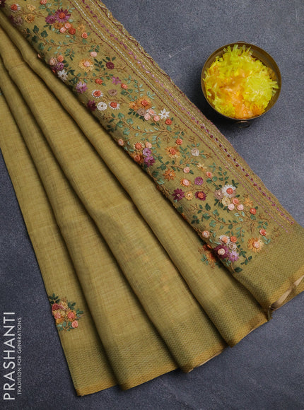 Linen cotton saree pale yellow with embroidery buttas and embroidery pallu