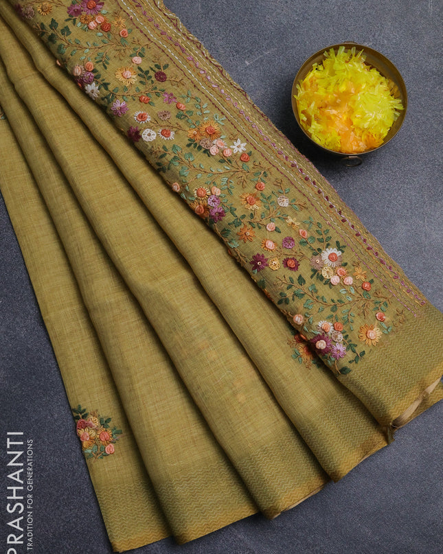 Linen cotton saree pale yellow with embroidery buttas and embroidery pallu