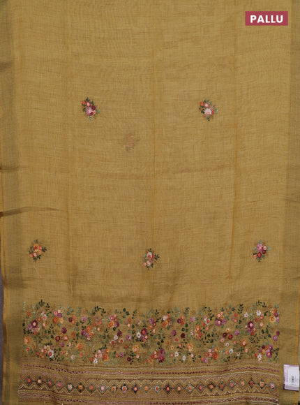 Linen cotton saree pale yellow with embroidery buttas and embroidery pallu