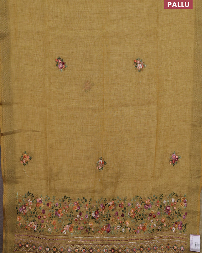 Linen cotton saree pale yellow with embroidery buttas and embroidery pallu