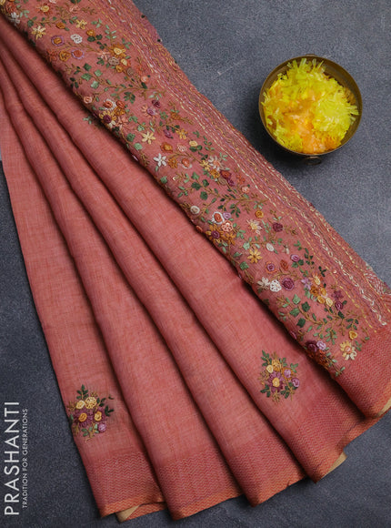 Linen cotton saree peach orange with embroidery buttas and embroidery pallu