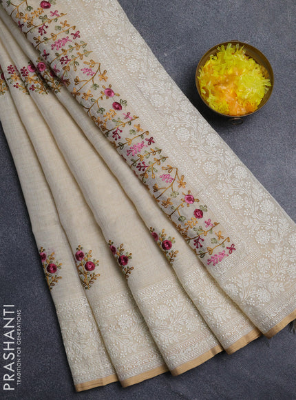 Linen cotton saree cream with embroidery buttas and embroidery pallu