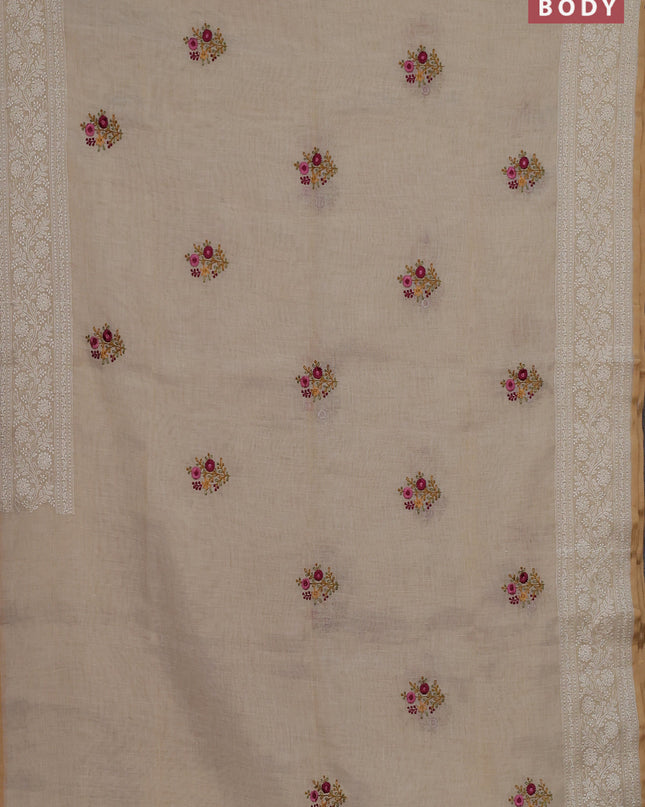 Linen cotton saree cream with embroidery buttas and embroidery pallu