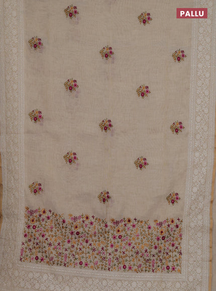 Linen cotton saree cream with embroidery buttas and embroidery pallu